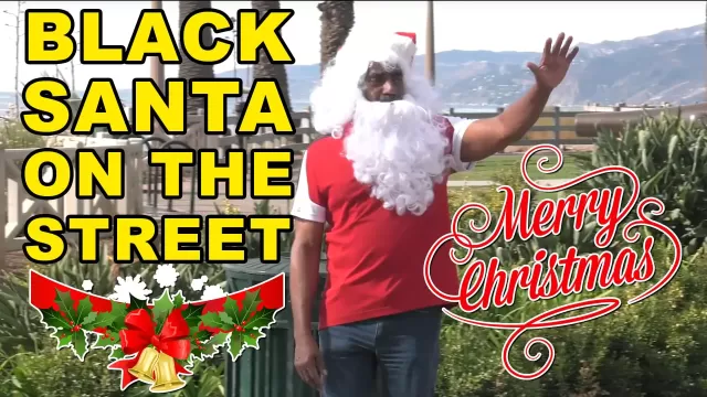 Jesse Lee Peterson dressed as Santa Clause